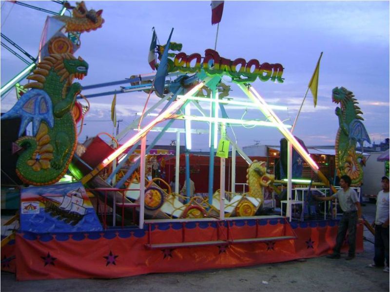 Renta de Juegos Mecánicos para niños Canoa Dragón